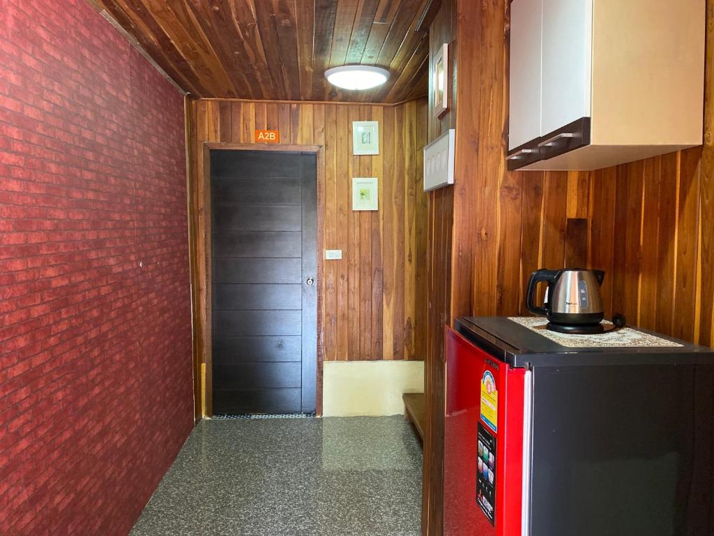 Kuchyň nebo kuchyňský kout v ubytování Yuwadee Resort