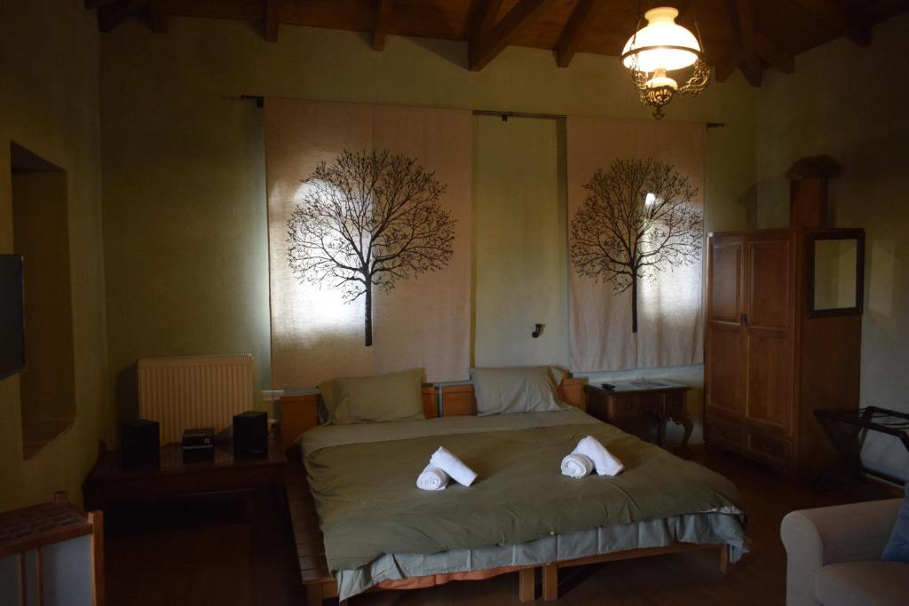 Postel nebo postele na pokoji v ubytování Great Mantineia