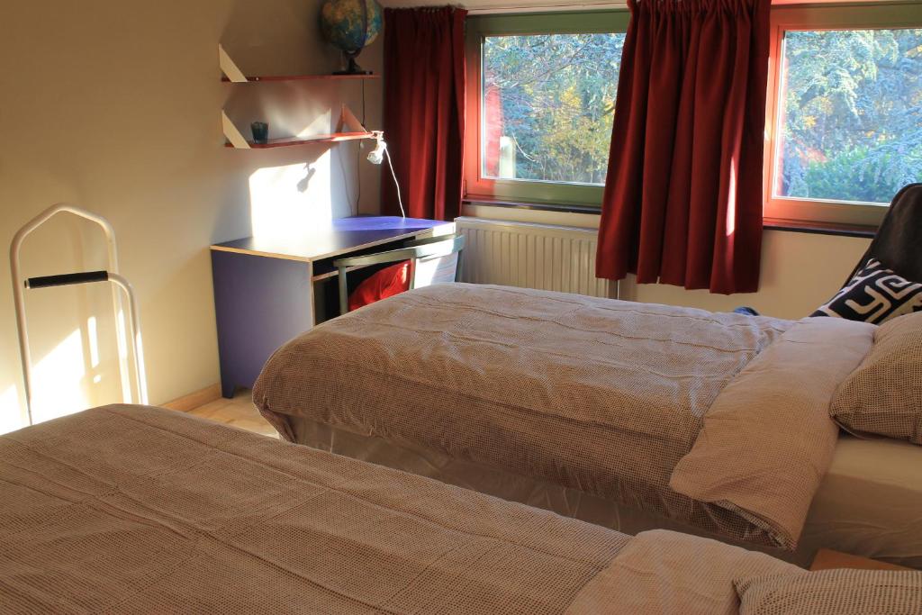 Postel nebo postele na pokoji v ubytování Beau Reg'Art