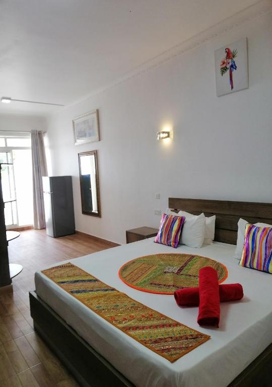 Postel nebo postele na pokoji v ubytování Easy Stay Residence