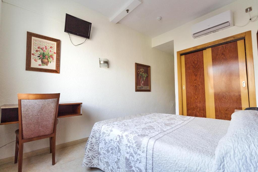 Postel nebo postele na pokoji v ubytování Nch Hotel Torremolinos