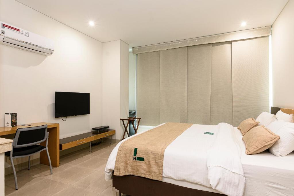 TV a/nebo společenská místnost v ubytování Hotel Lincoln
