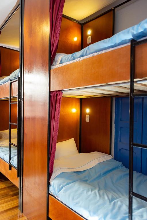 Postel nebo postele na pokoji v ubytování Granada Hostel