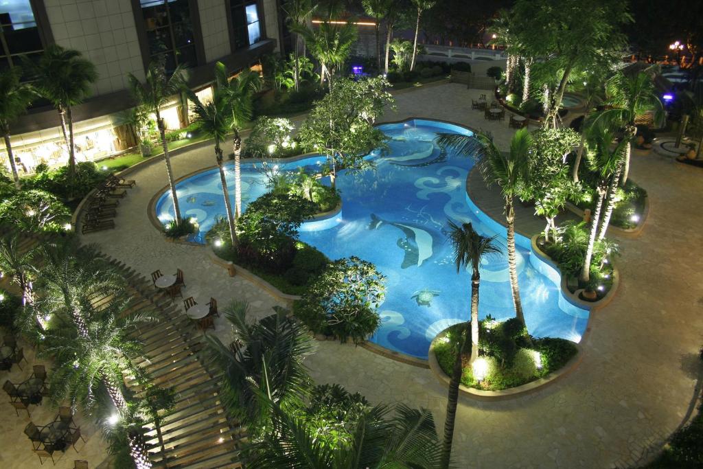 Bazén v ubytování Huizhou Kande International Hotel nebo v jeho okolí