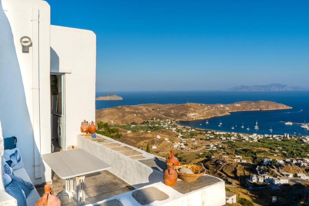 a balcony with a view of the ocean at SeaScapeHome Serifos in Serifos Chora