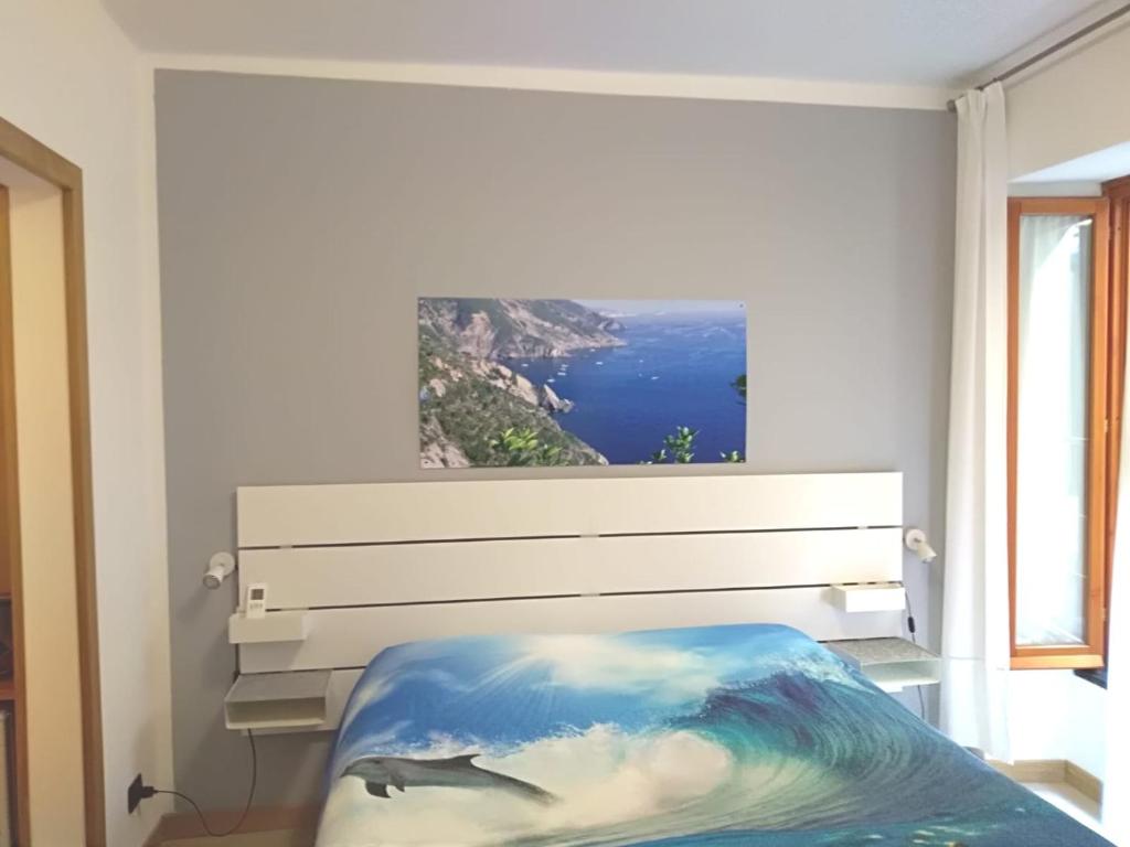 Postel nebo postele na pokoji v ubytování Cà de Angelo
