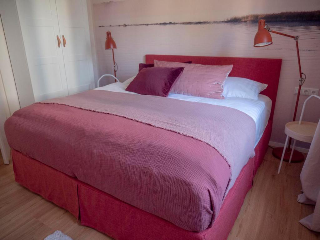 Posteľ alebo postele v izbe v ubytovaní Red flat by GrazRentals direct by University & free parking