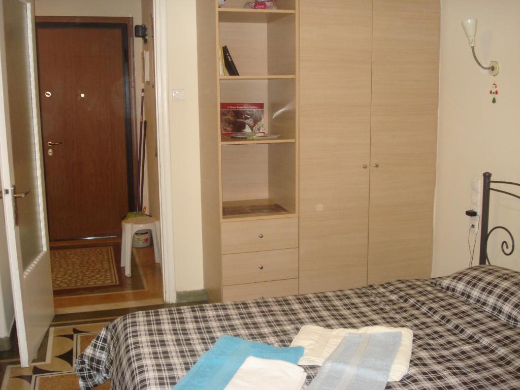 Łóżko lub łóżka w pokoju w obiekcie Apartment city center