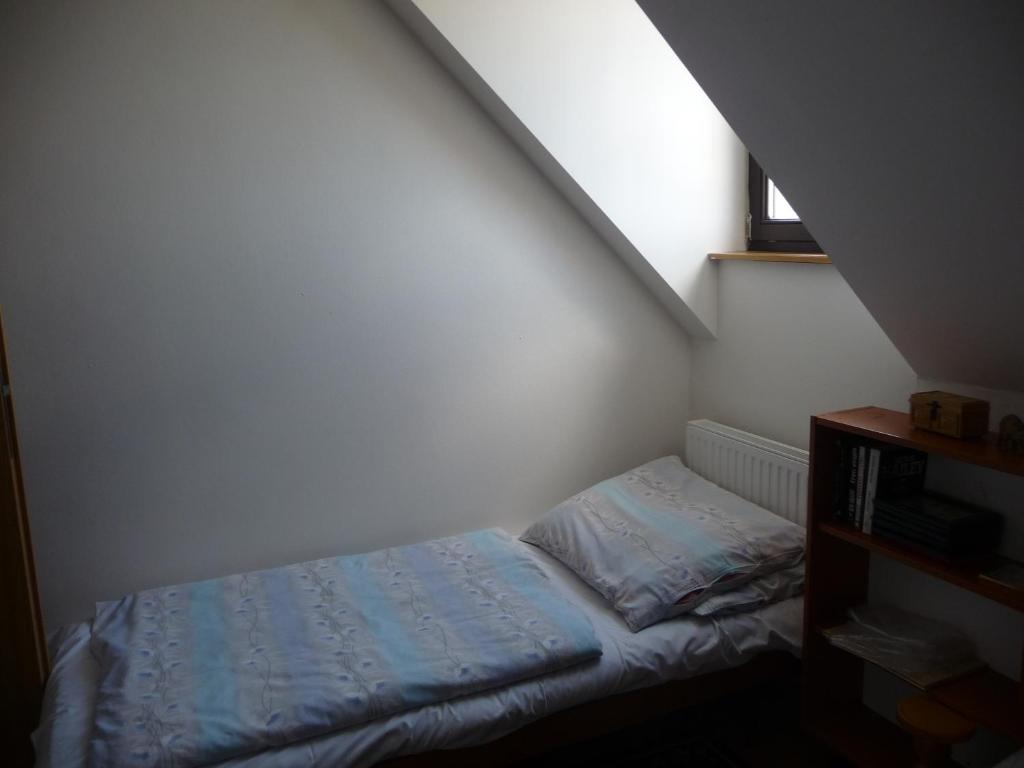 Postel nebo postele na pokoji v ubytování Chata na Pustevnách