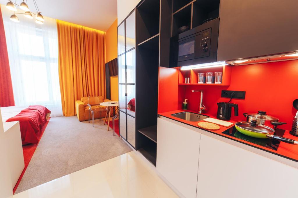 Kuchyň nebo kuchyňský kout v ubytování Cities Gallery Apart-hotel