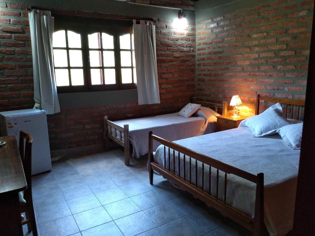 Tempat tidur dalam kamar di El Indalo La Calderilla