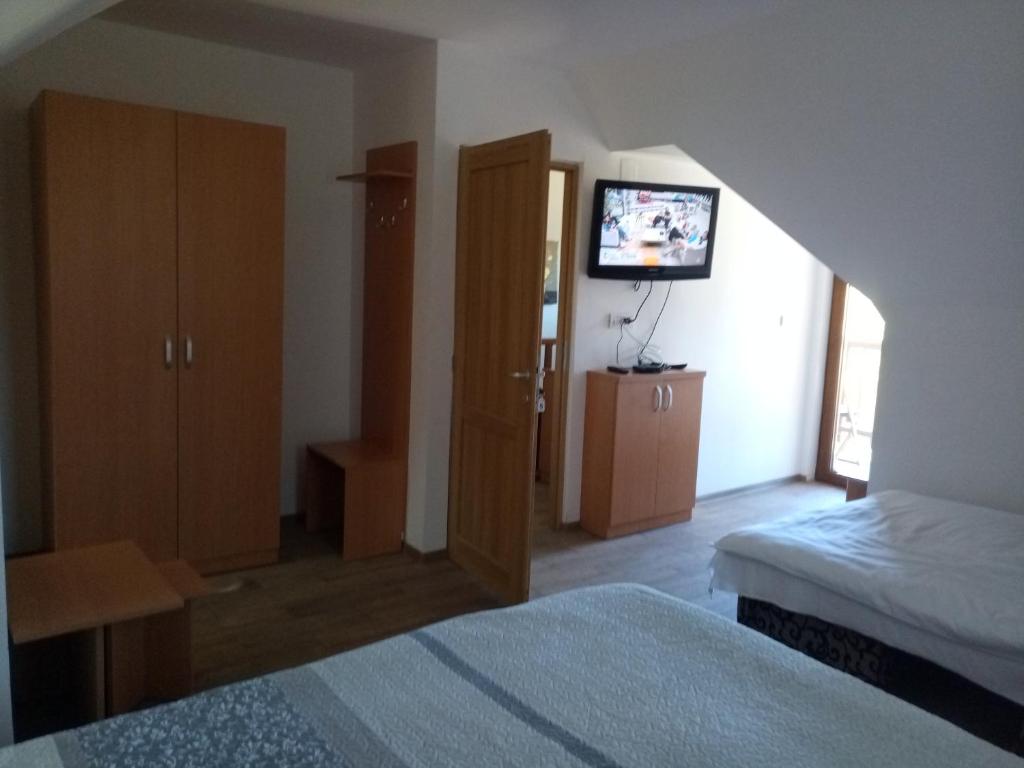 Postel nebo postele na pokoji v ubytování Vidra Parc