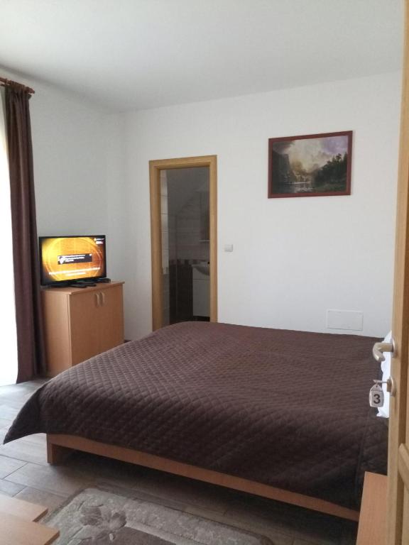 Postel nebo postele na pokoji v ubytování Vidra Parc