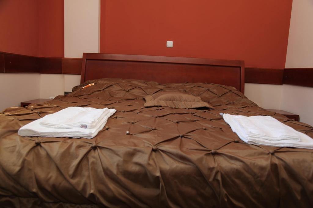 Postel nebo postele na pokoji v ubytování Hotel Cingo