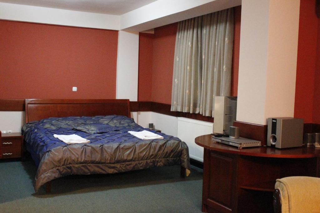 Postel nebo postele na pokoji v ubytování Hotel Cingo
