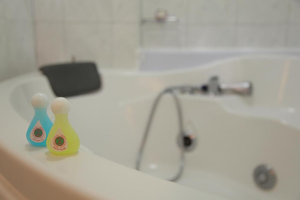 Koupelna v ubytování Hotel Cingo