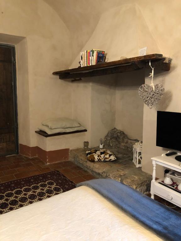 TV a/nebo společenská místnost v ubytování Tenuta di Vico Moricino