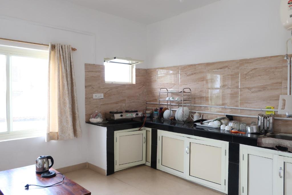 Kuchyň nebo kuchyňský kout v ubytování Zhim Zhim Guest House