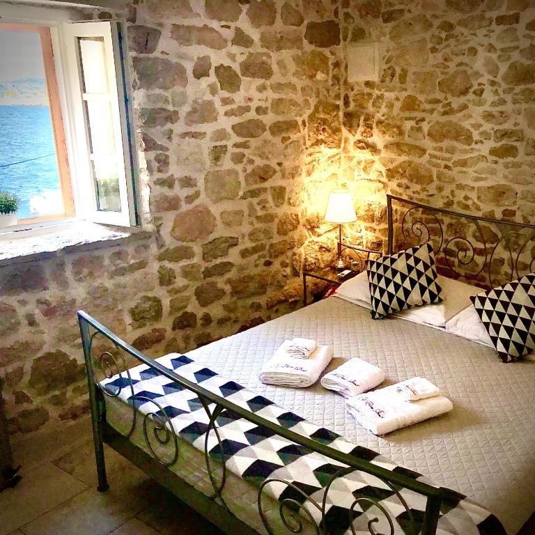 Posteľ alebo postele v izbe v ubytovaní City Rooms Šibenik