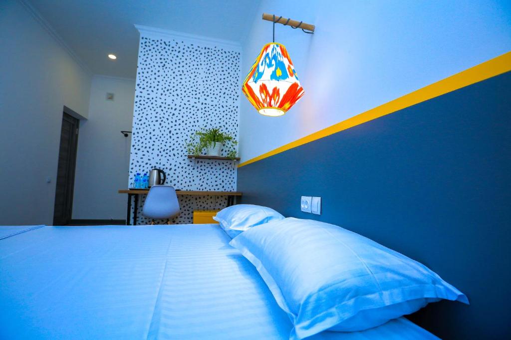 Cama o camas de una habitación en Art Samarqand