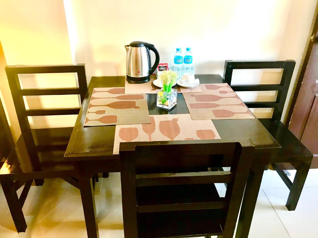 Příslušenství pro přípravu čaje a kávy v ubytování V.F. Riton Apartelle