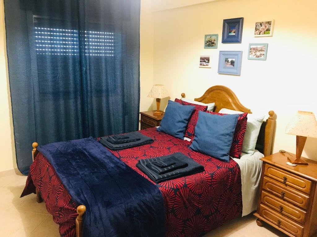 Uma cama ou camas num quarto em Flat in the Heart of Algarve