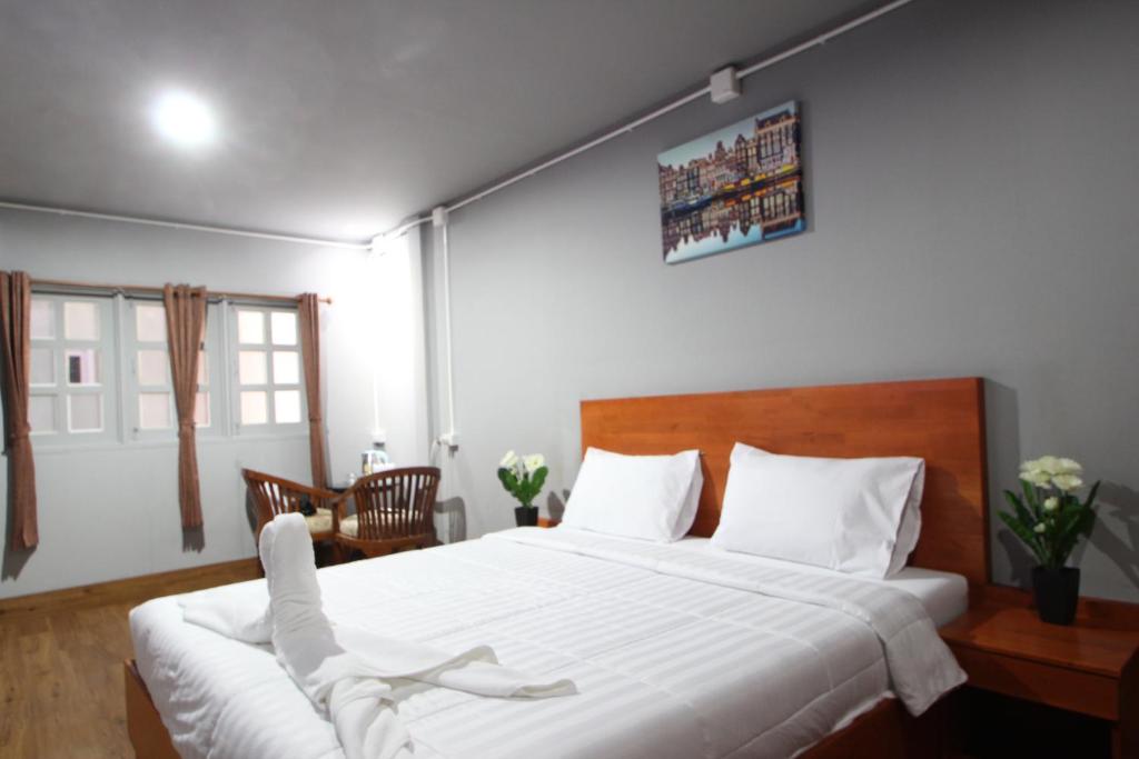 Postel nebo postele na pokoji v ubytování Aladdin Guest House