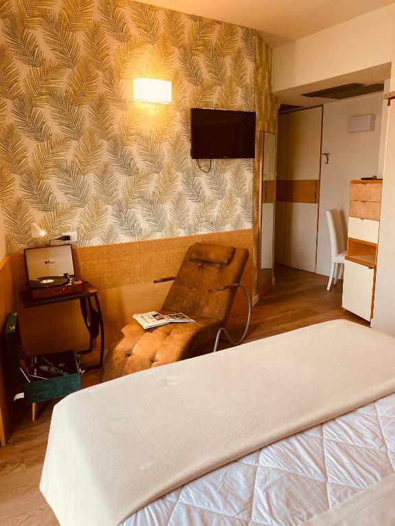 Postel nebo postele na pokoji v ubytování Hotel Montecarlo - Vista Mare con Piscina & Area Fitness
