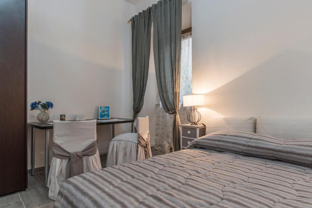 Łóżko lub łóżka w pokoju w obiekcie Ad un passo da Villa Borghese Apartment