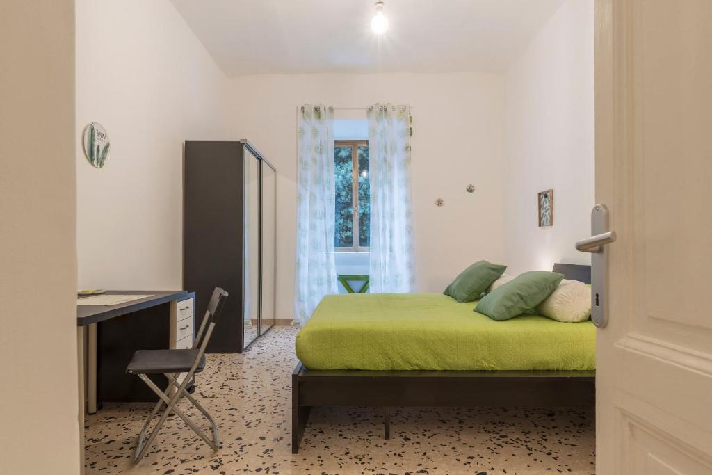 Łóżko lub łóżka w pokoju w obiekcie Ad un passo da Villa Borghese Apartment