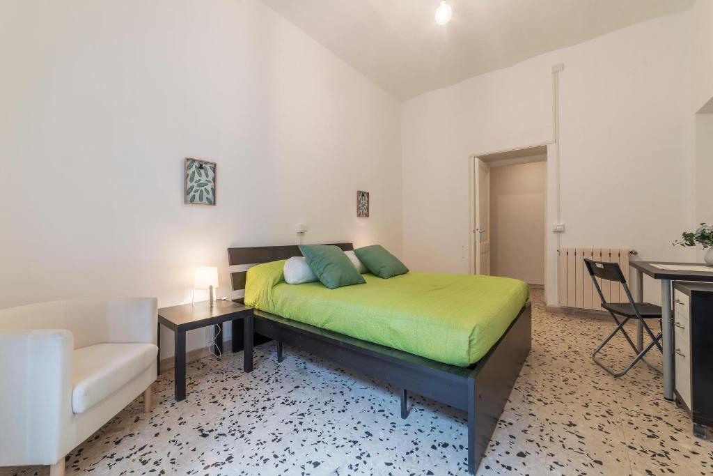 Łóżko lub łóżka w pokoju w obiekcie Ad un passo da Villa Borghese Apartment