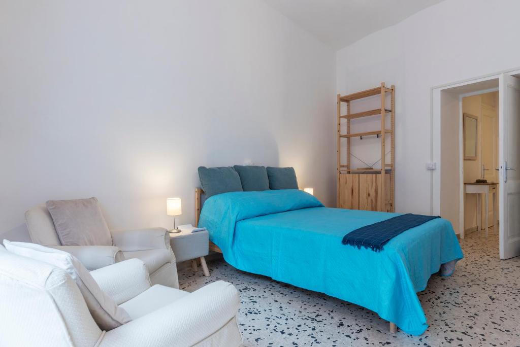 Łóżko lub łóżka w pokoju w obiekcie Ad un passo da Villa Borghese Apartment
