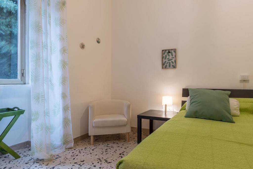 Łóżko lub łóżka w pokoju w obiekcie Ad un passo da Villa Borghese Apartment