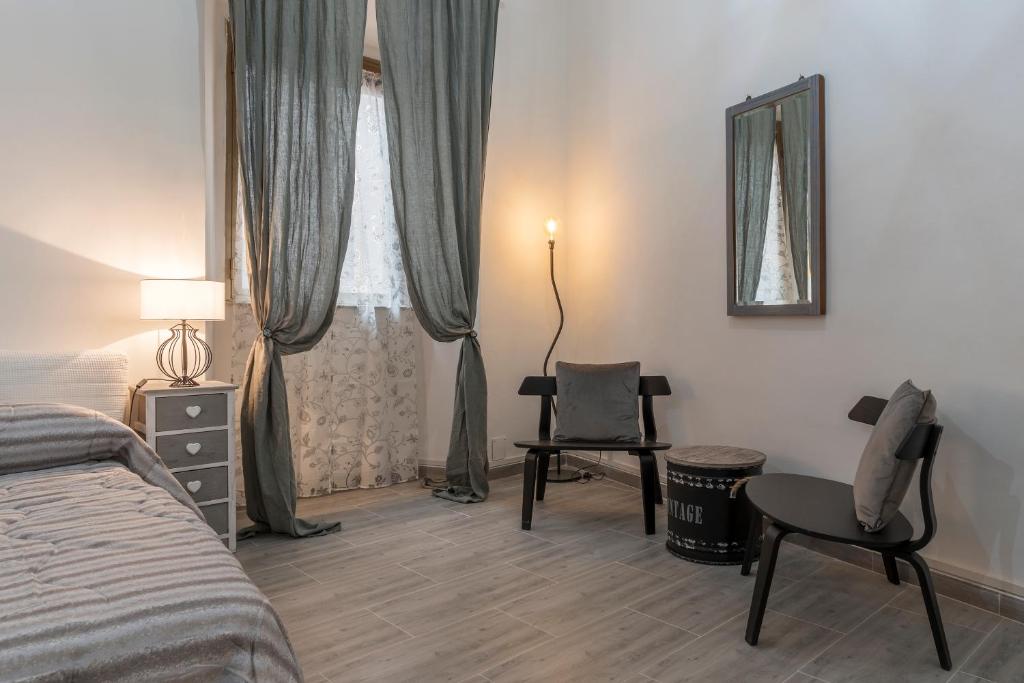 Łóżko lub łóżka w pokoju w obiekcie Ad un passo da Villa Borghese Apartment