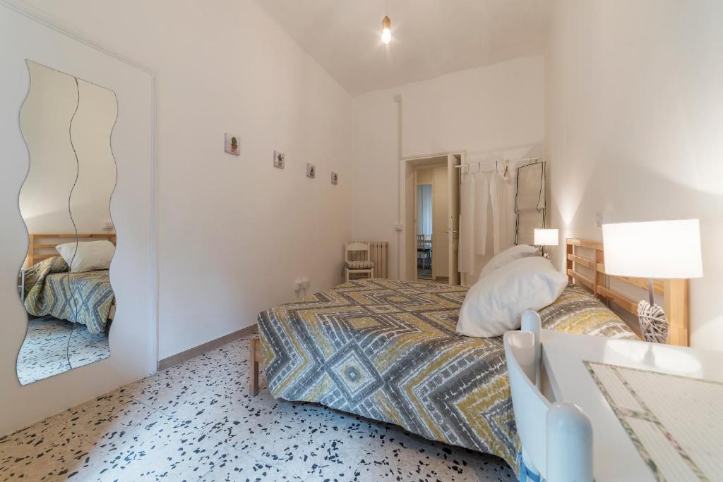Łóżko lub łóżka w pokoju w obiekcie Ad un passo da Villa Borghese Apartment