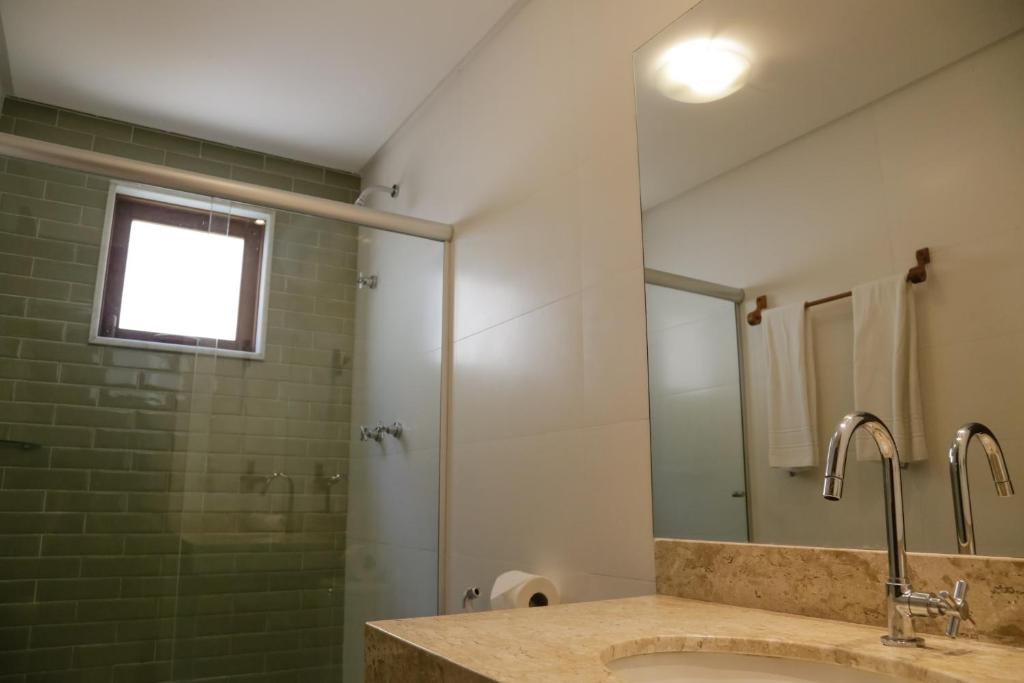 Koupelna v ubytování Cores do Arraial Residence Hotel