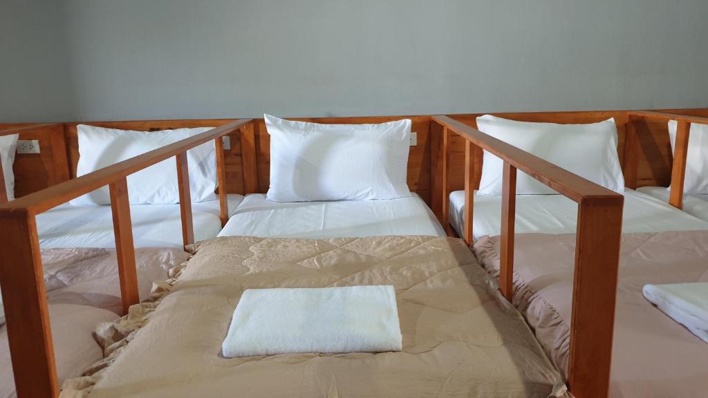 Postel nebo postele na pokoji v ubytování Aladdin Guest House