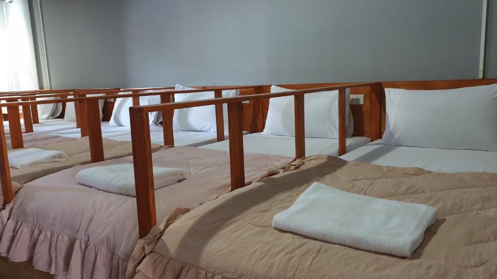 Postel nebo postele na pokoji v ubytování Aladdin Guest House