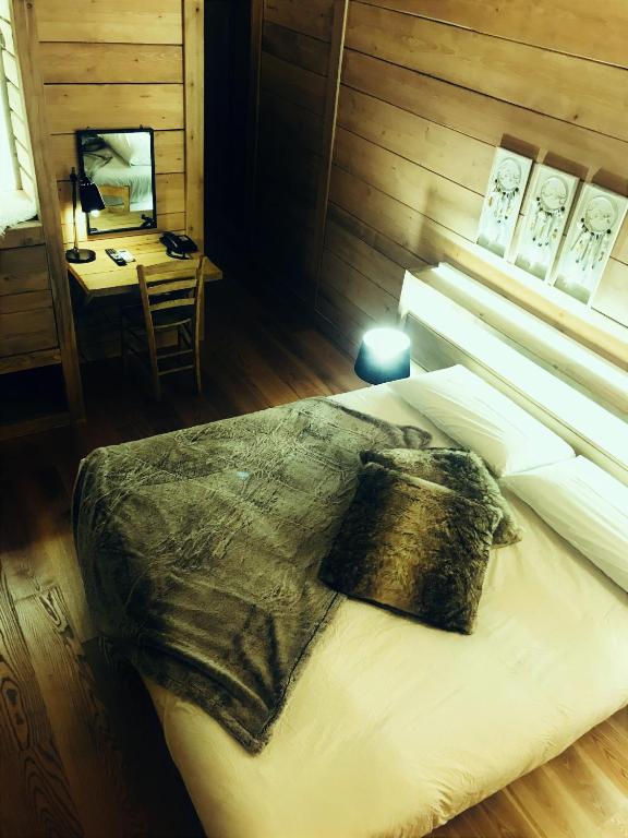 Postel nebo postele na pokoji v ubytování Cà Virò