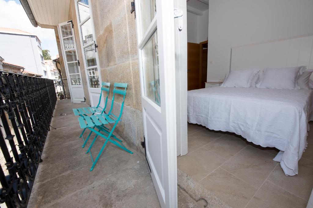 Postel nebo postele na pokoji v ubytování Pension Casa da Nena