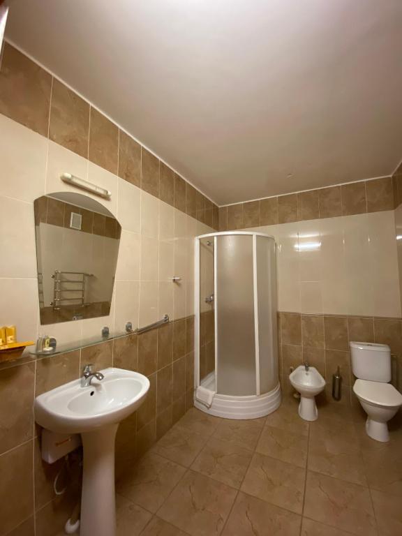 Koupelna v ubytování Hotel Obolon