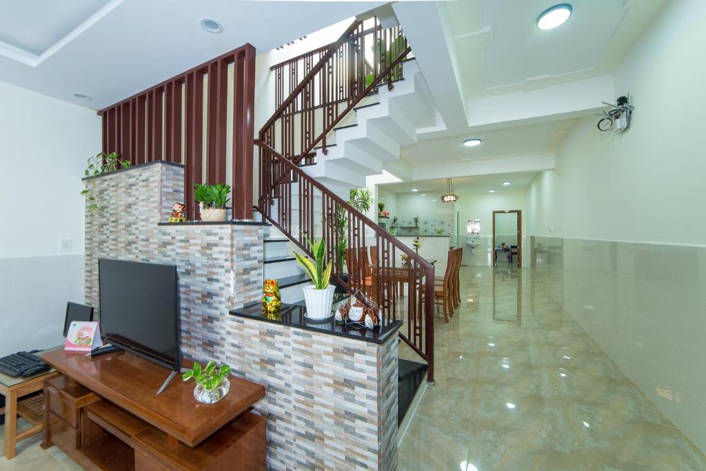 TV a/nebo společenská místnost v ubytování Coco Village Homestay Hoi An