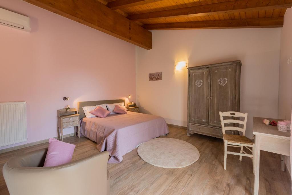 Postel nebo postele na pokoji v ubytování Sara&Sara alloggio agrituristico