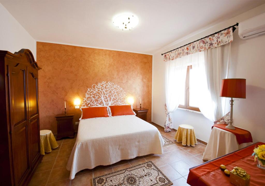 Кровать или кровати в номере Casale la Rovere