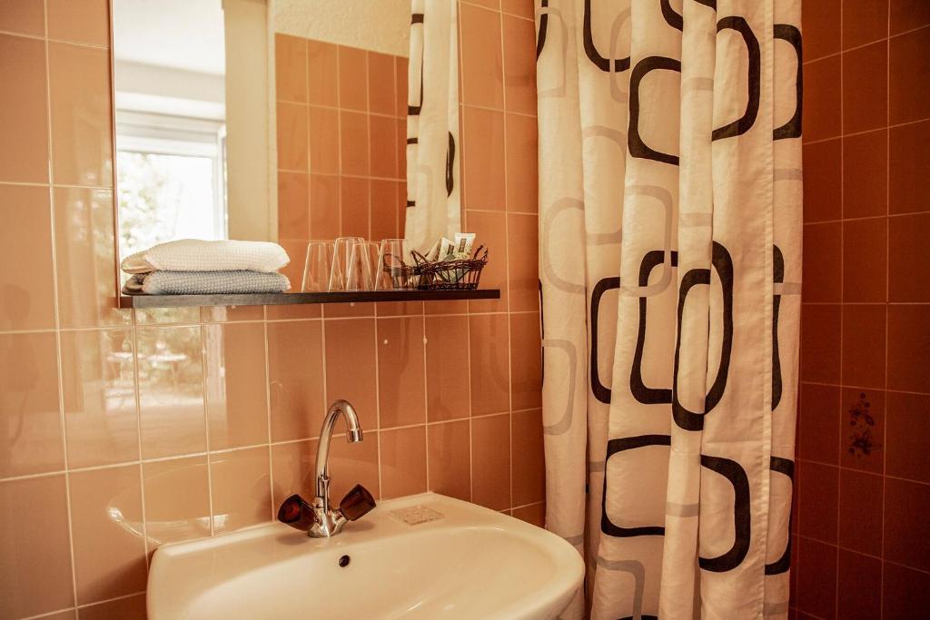 Koupelna v ubytování Hôtel Du Soleil