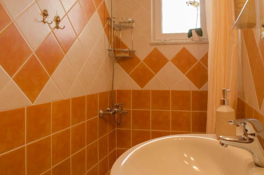 Łazienka w obiekcie Villa Aretaki