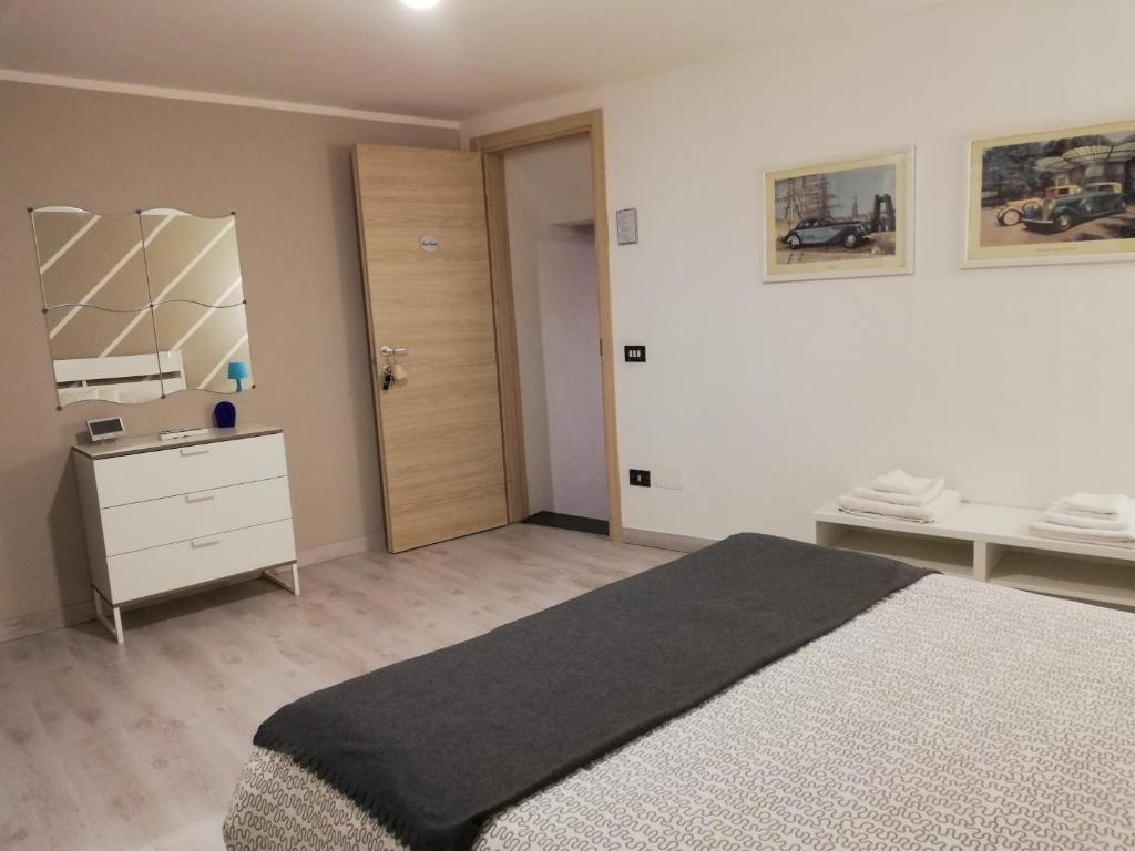 Postel nebo postele na pokoji v ubytování Palazzo Sant'Elia