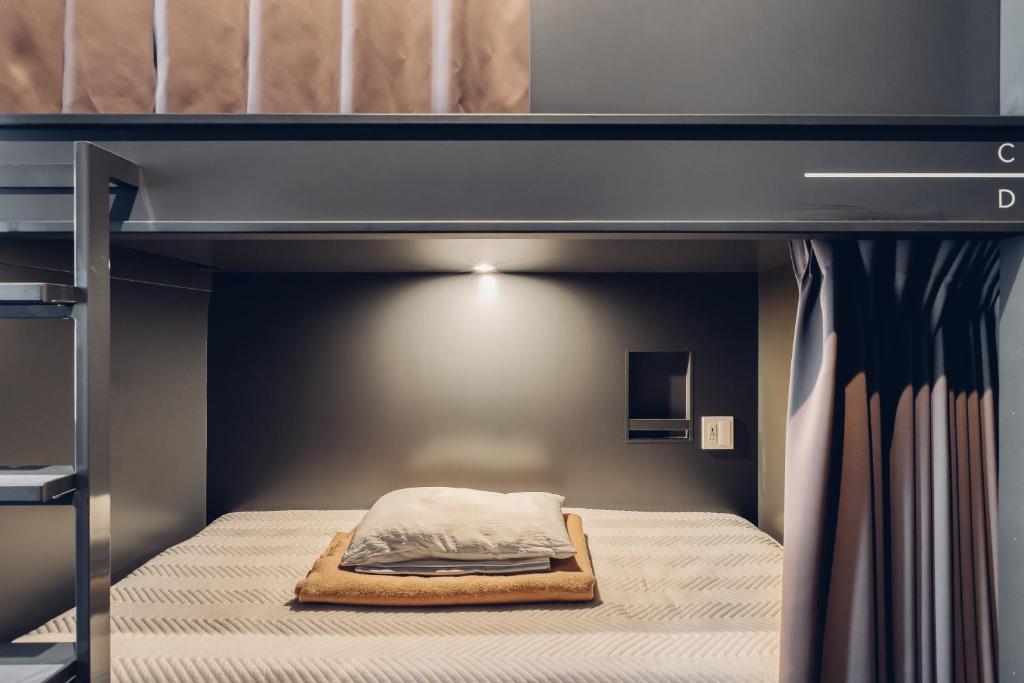 Postel nebo postele na pokoji v ubytování BON Hostel