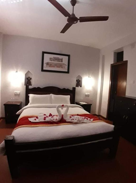 Voodi või voodid majutusasutuse The Hotel toas