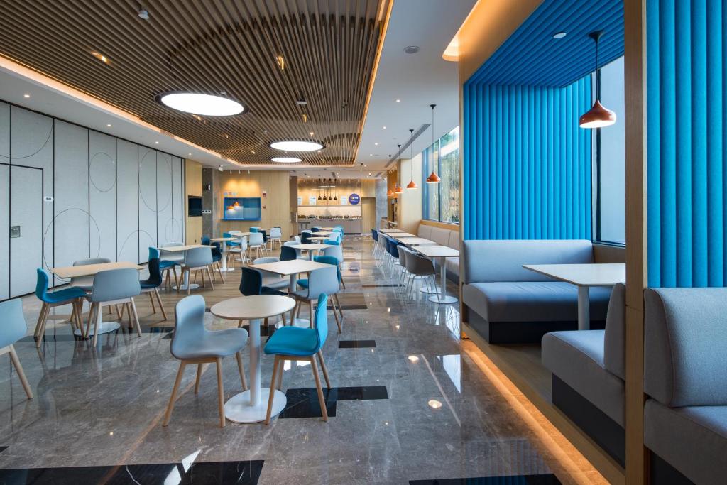 Posezení v ubytování Holiday Inn Express Shanghai Kangqiao by IHG